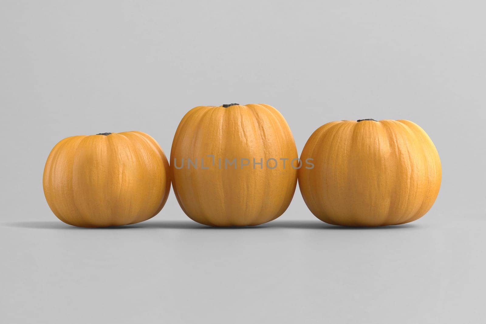 Three yellow pumpkins are highlighted on a light gray background