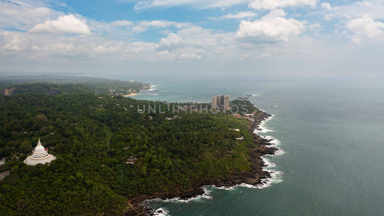 Tourist coastline with beaches and hotels. Unawatuna, Sri Lanka.
