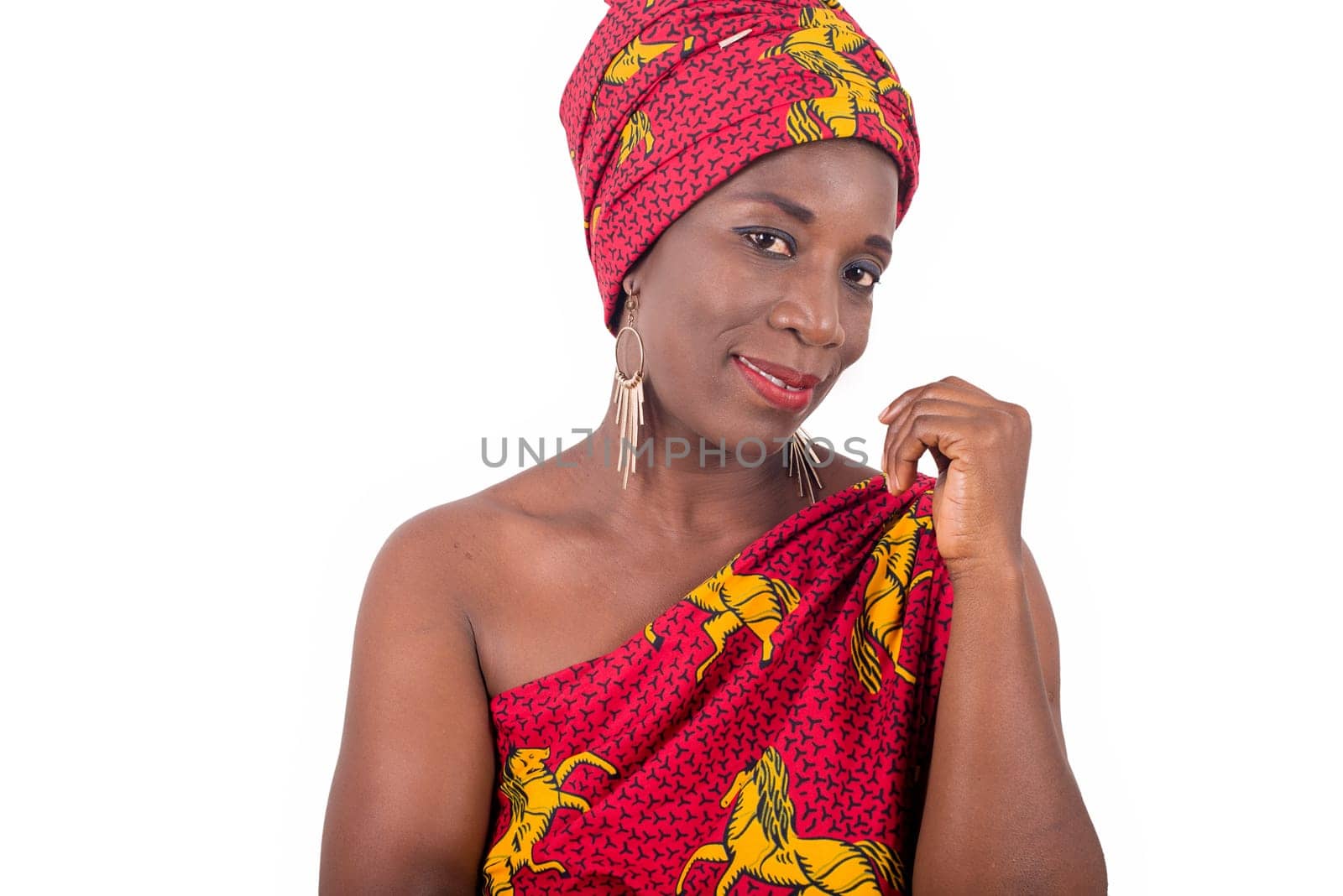 Portrait beautiful African woman in traditional turban, head and body wrapping, African fashionable