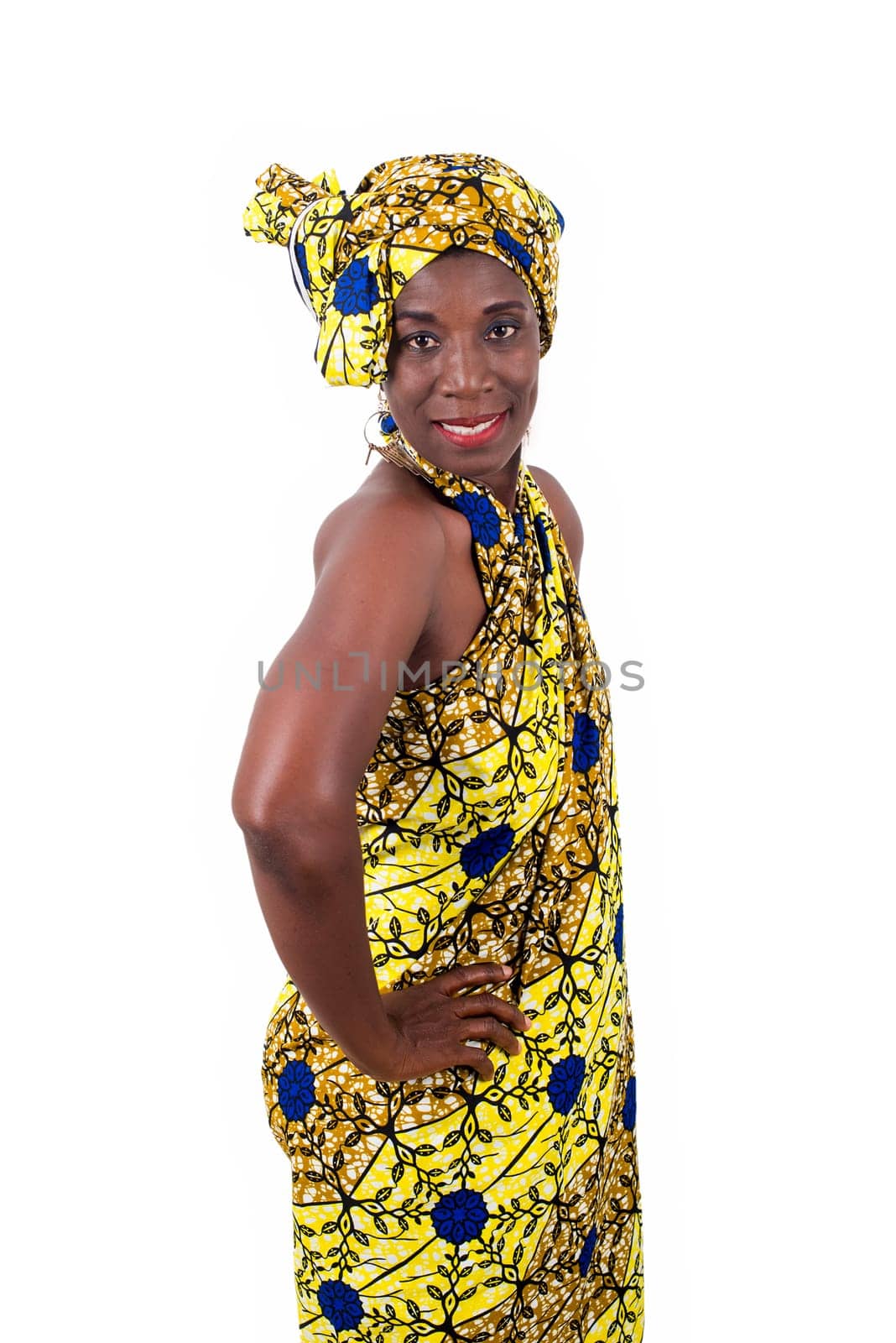African woman in yellow loincloth posing happily isolated on white background