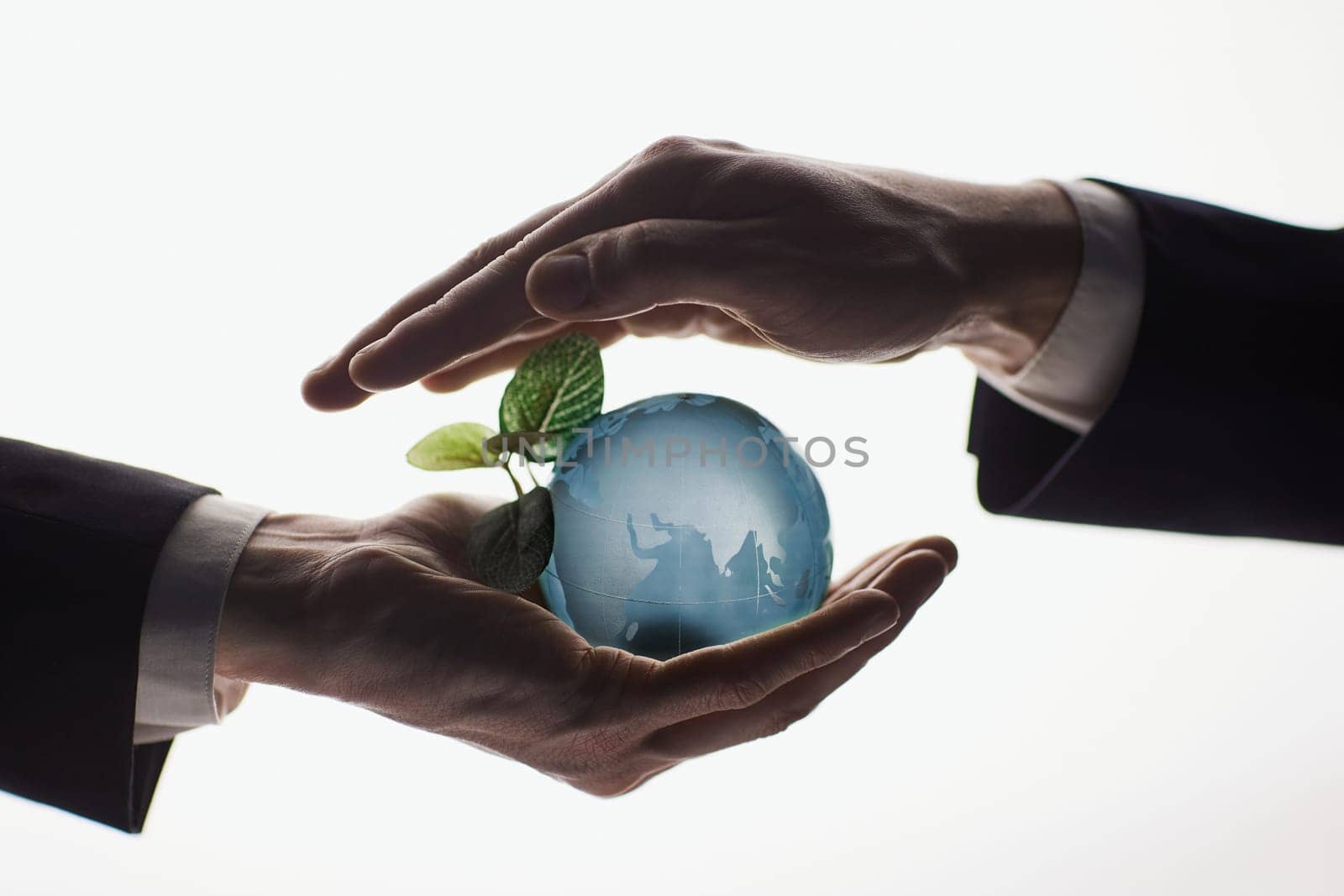 Human Hand Holding the World in Hands on white background by Prosto
