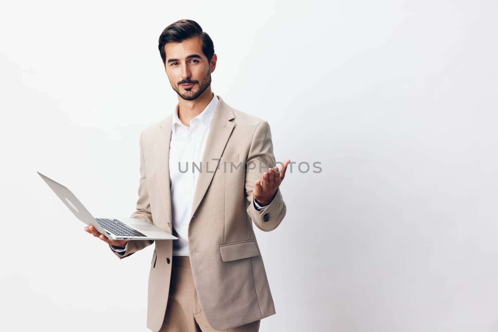 man laptop copyspace smiling portrait suit wireless businessman male job isolated freelancer young working business technology manager computer shirt internet happy