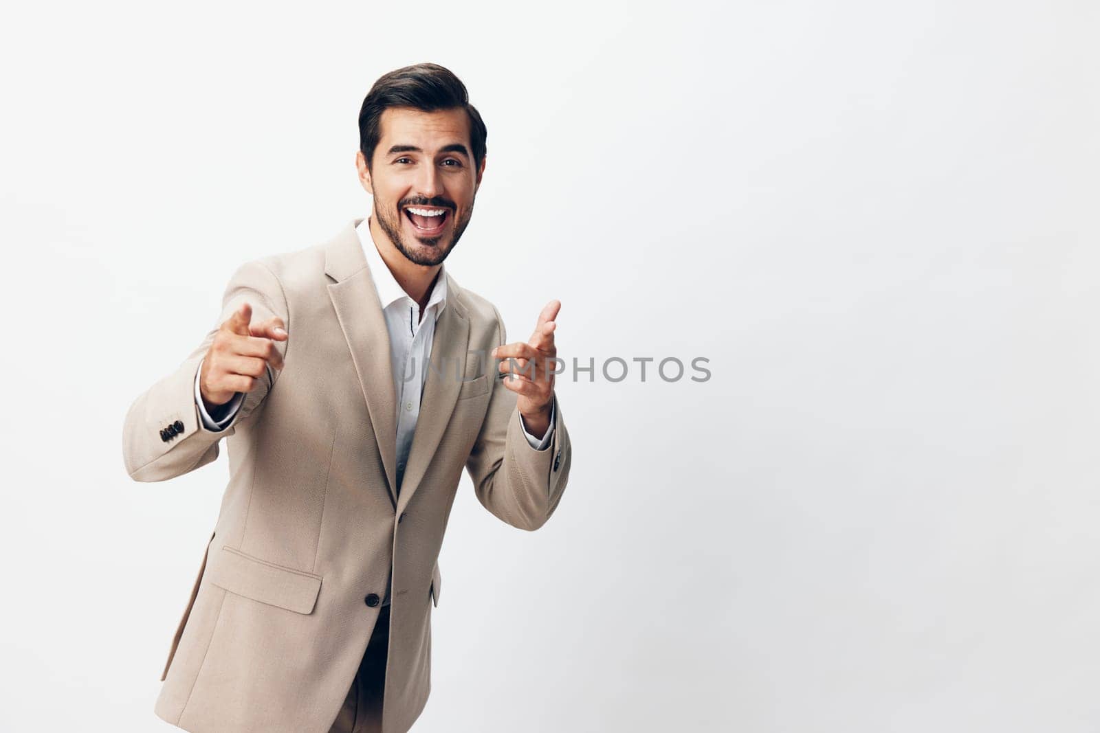smiling man success suit handsome beige background stylish portrait beard sexy businessman person job corporate grey copyspace executive business happy tie smile