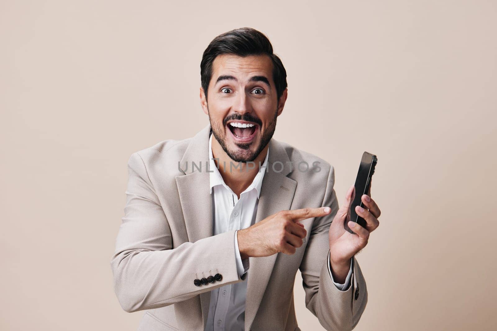 trading man application suit portrait cell smartphone lifestyle mobile happy smile male hold isolated adult beard blogger young phone call business