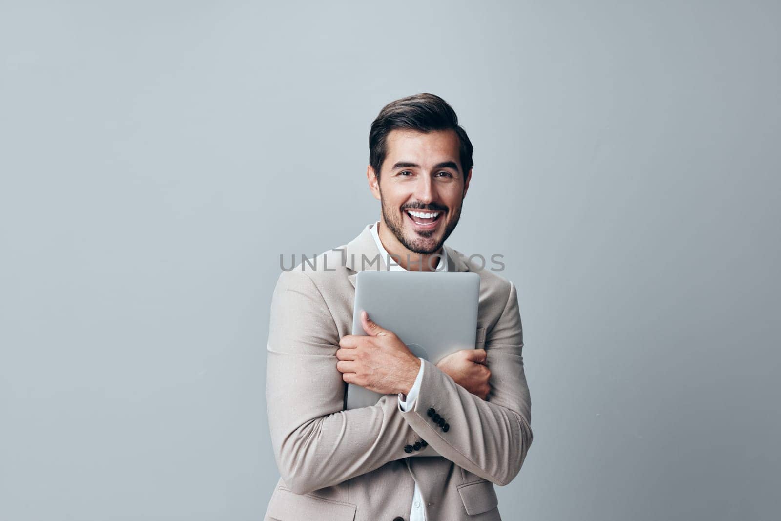 man job internet notebook beige corporate smiling portrait shirt suit cyberspace laptop copyspace person white computer business smile adult stylish freelancer