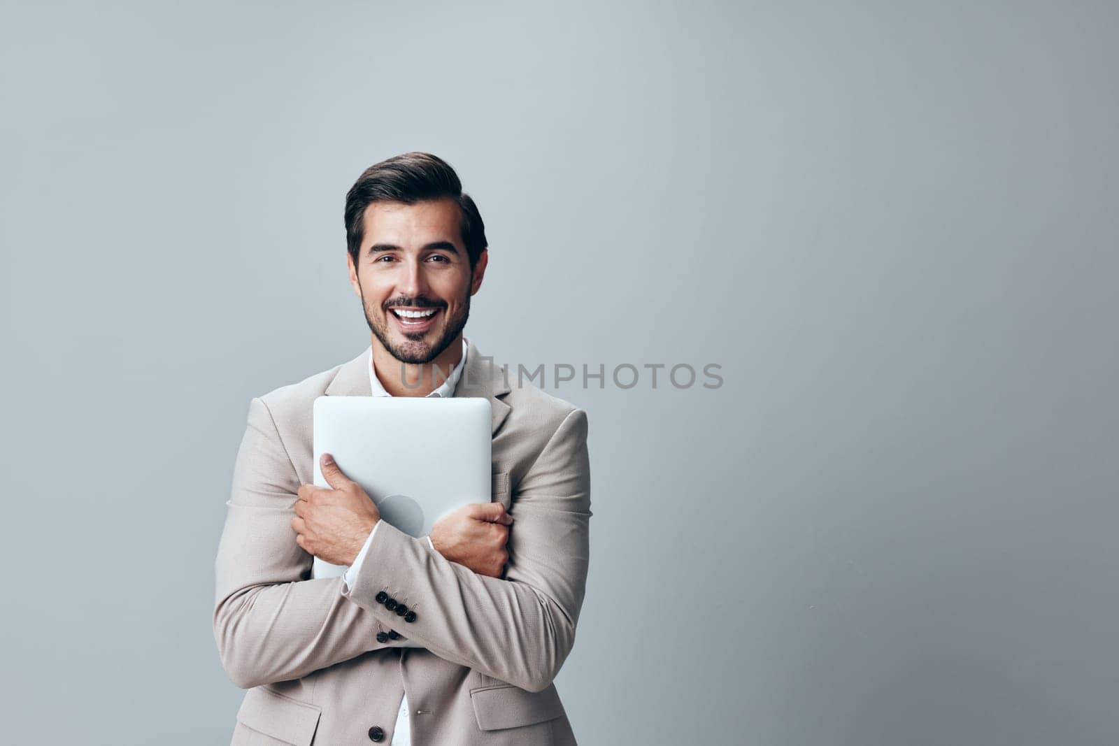 man stylish laptop digital person computer business job beige shirt entrepreneur copyspace smiling internet beard suit adult freelancer cheerful network office