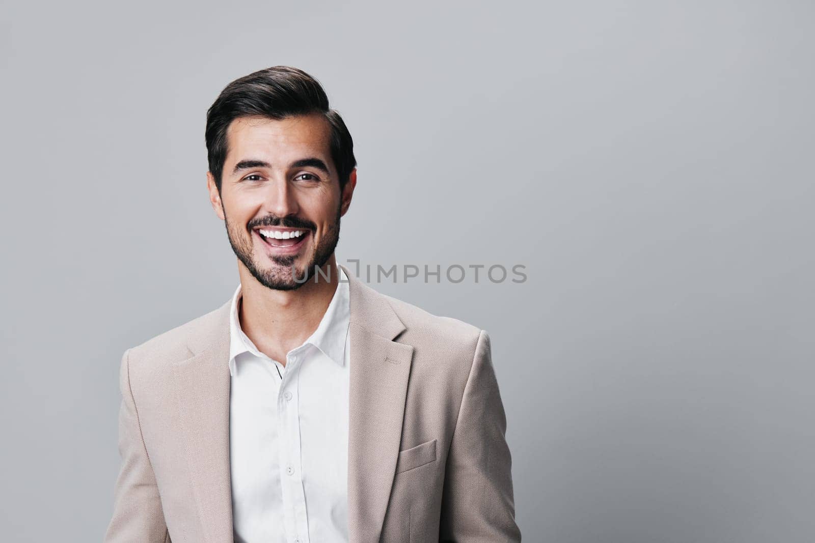 man smiling beige portrait businessman business handsome happy copyspace suit background corporate by SHOTPRIME