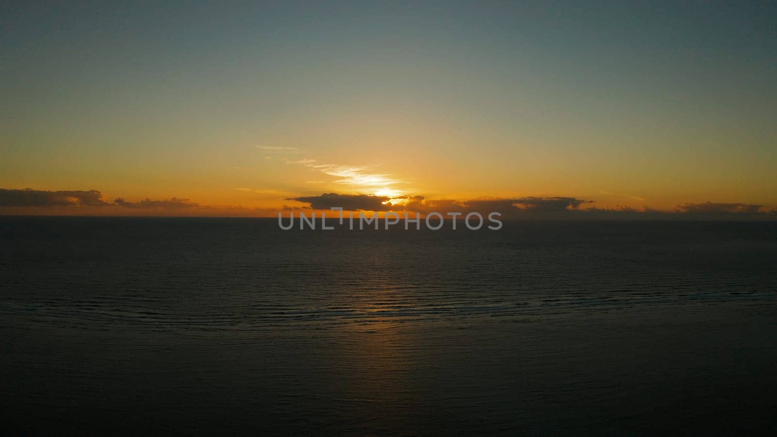 Colorful sunrise over sea, top view. Sunrise over ocean. Philippines
