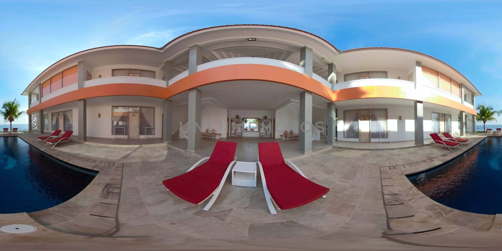 vr 360 swimming pool in luxury hotel with sun beds by sea. tropical resort with pool. Travel concept.