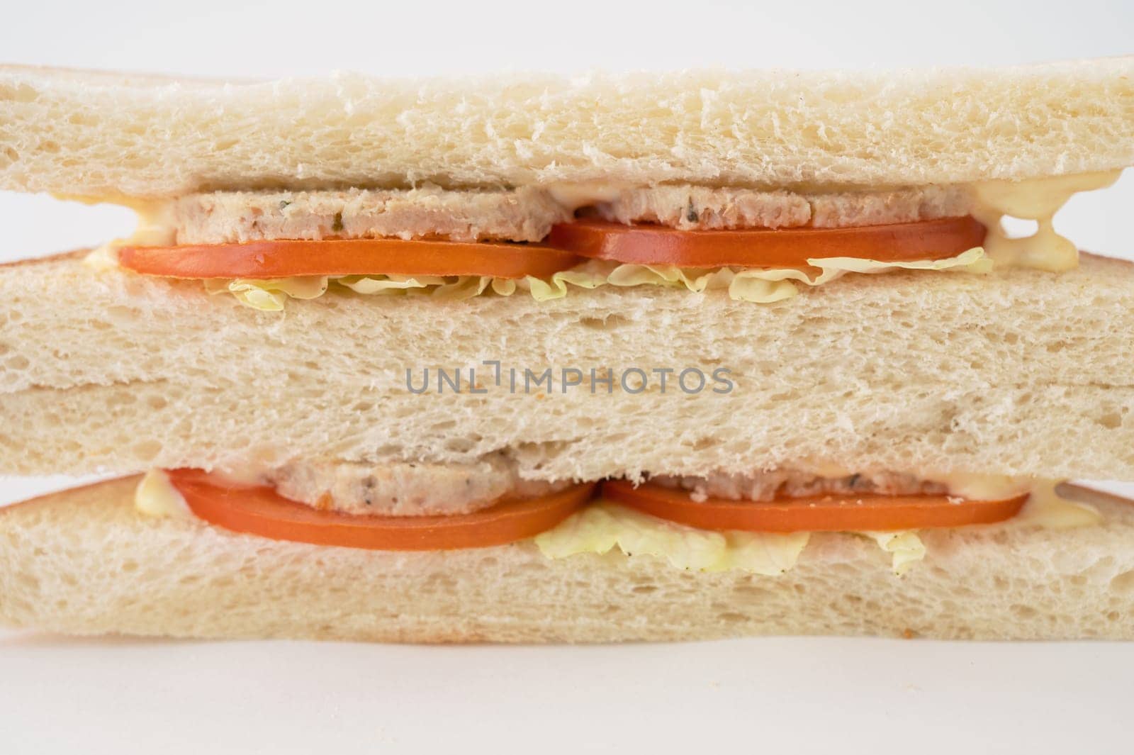 Meat sandwich with fresh tomato and cabbage