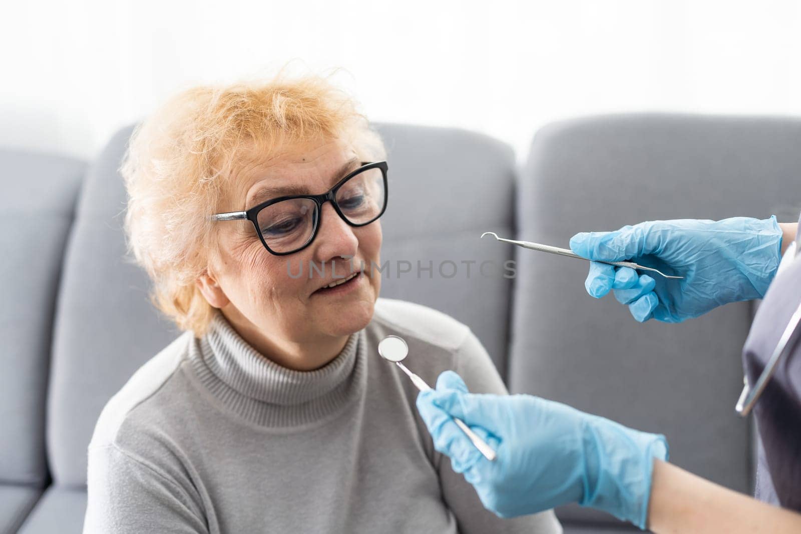 Female dentist and her patient