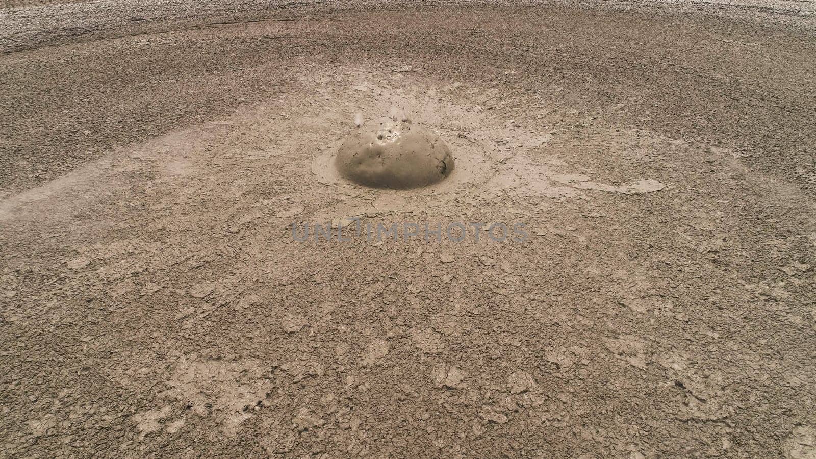 Mud volcano bledug kuwu. aerial view volcanic plateau with geothermal activity and geysers, Indonesia java. aerial view volcanic landscape