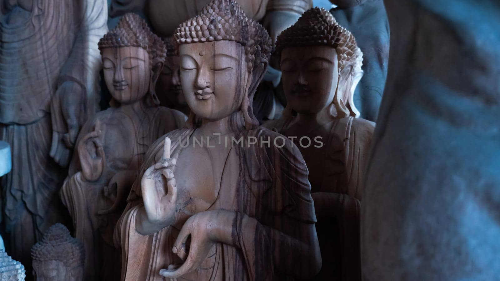Hindu and Buddhist wooden carving. souvenir shop selling souvenirs and handicrafts of Bali at famous Ubud Market, Indonesia