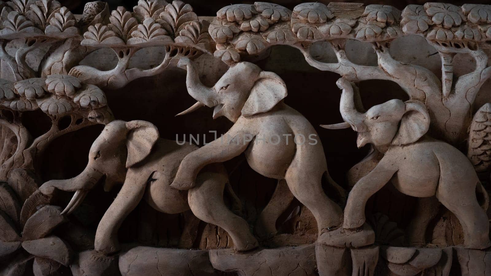 Hindu and Buddhist wooden carving. souvenir shop selling souvenirs and handicrafts of Bali at famous Ubud Market, Indonesia