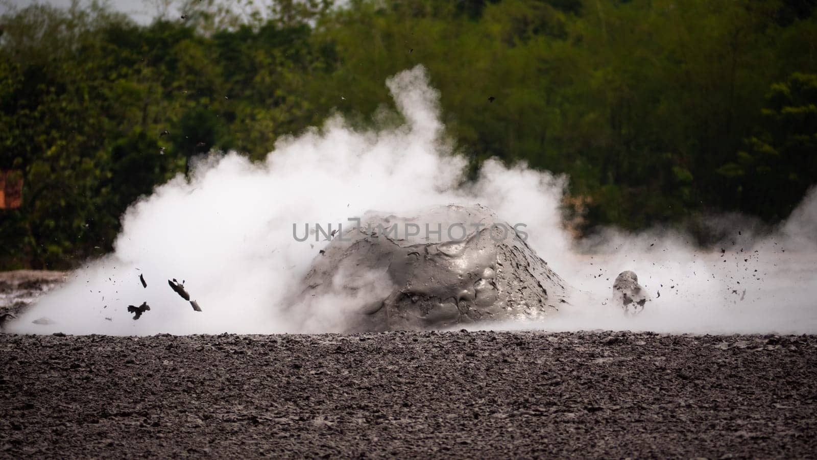 mud volcano with bursting bubble bledug kuwu. volcanic plateau with geothermal activity and geysers, slow motion Indonesia java. volcanic landscape
