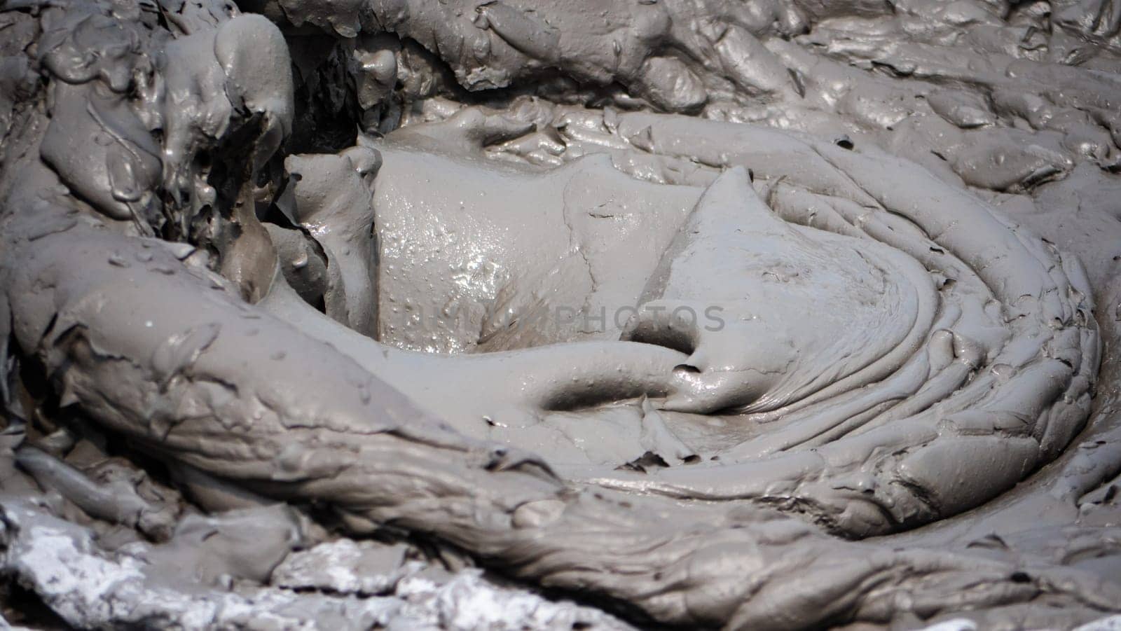 Mud volcano bledug kuwu. volcanic plateau with geothermal activity and geysers, Indonesia java. aerial view volcanic landscape