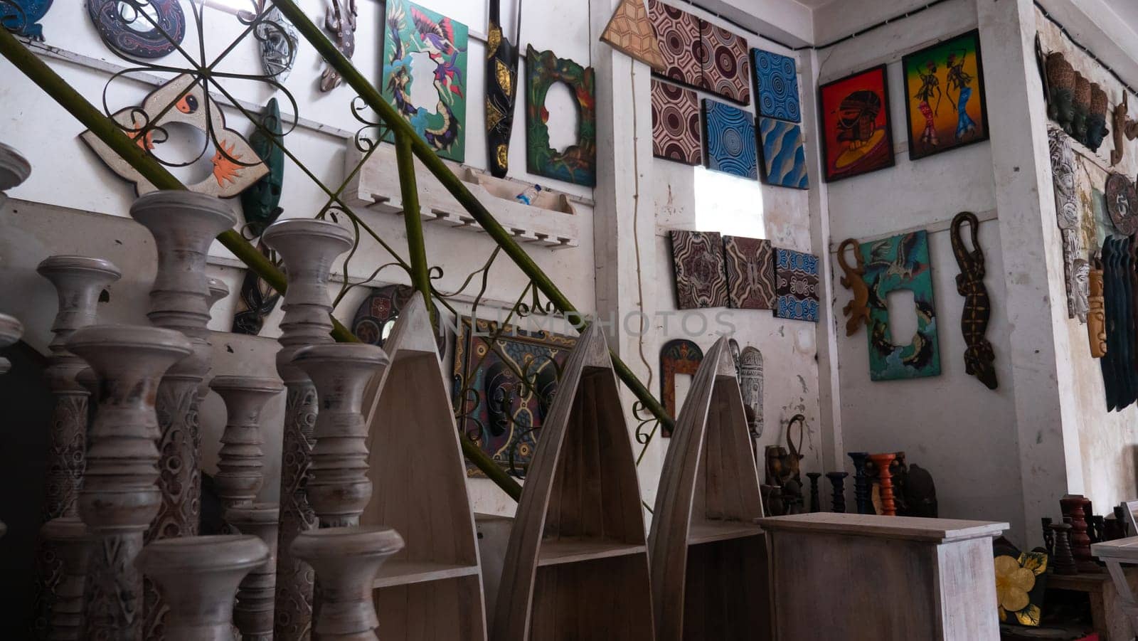 Hindu and Buddhist wooden carving. souvenir shop selling souvenirs and handicrafts of Bali at famous Ubud Market, Indonesia