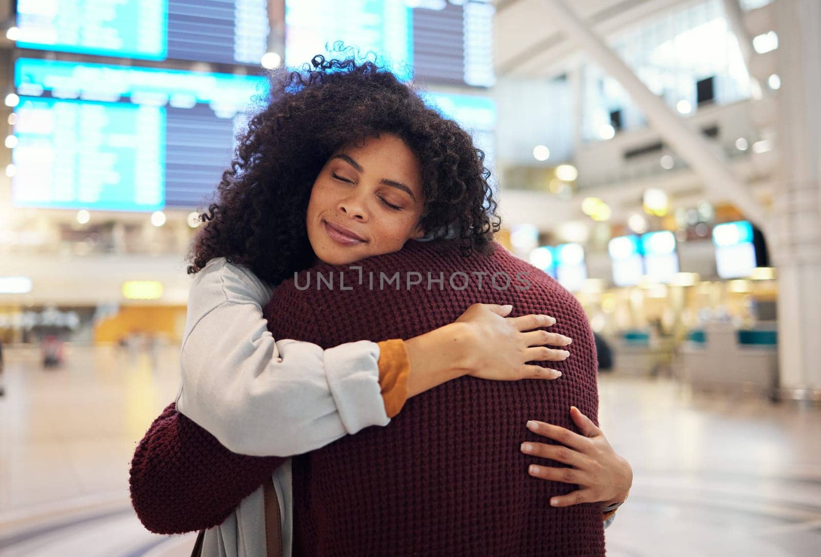 Couple, hug and embracing goodbye at airport for travel, trip or flight in farewell for long distance relationship. Man and woman hugging before traveling, departure or immigration and arrival.