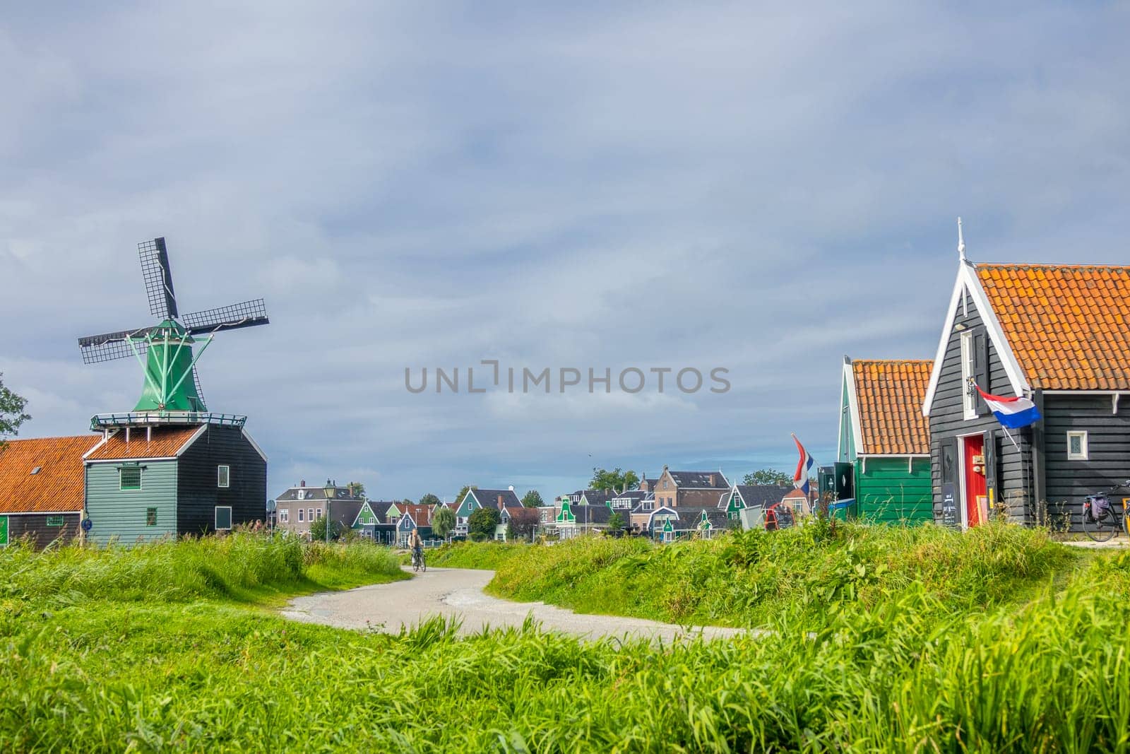 Netherlands. Zaanse Schans. Typical rural Dutch houses and vintage windmill