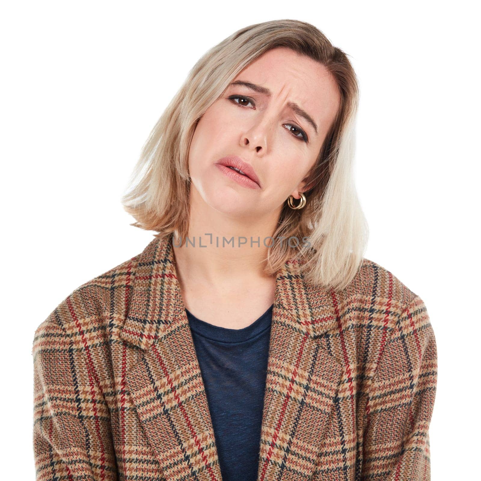 Portrait, sad or white background and a woman isolated in studio with an unhappy or negative expression. Face, sadness and depression with an unhappy young female posing on blank branding space by YuriArcurs