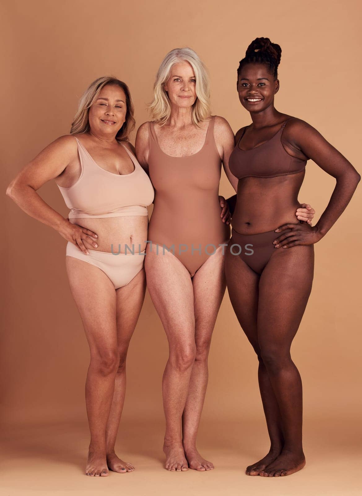 Body positive, support and portrait of diversity women happy with self love, natural beauty and confidence in shape size. Woman empowerment, solidarity and group of model girl friends with lingerie.