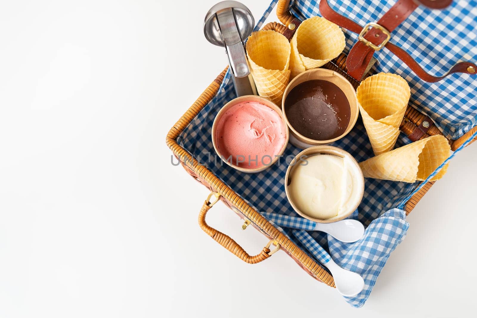 Ice cream suitcase. Takeaway ice cream - a box with different ice creams, a spoon, a waffle glass