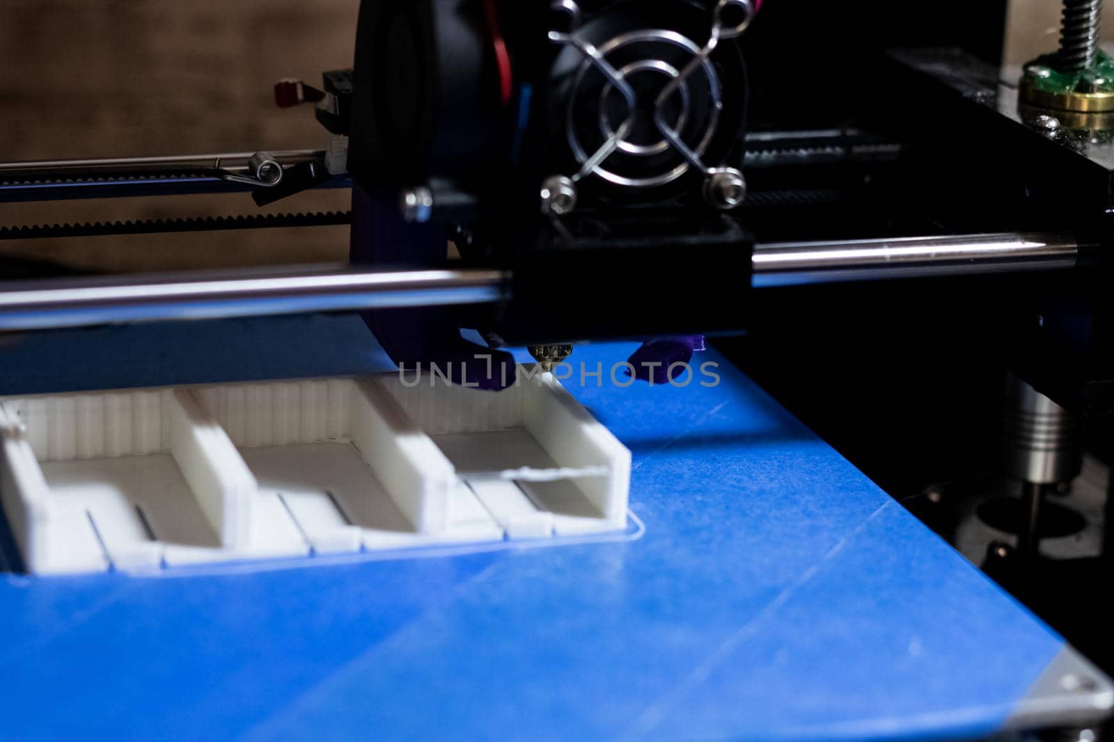 The process of printing on a 3D printer close up