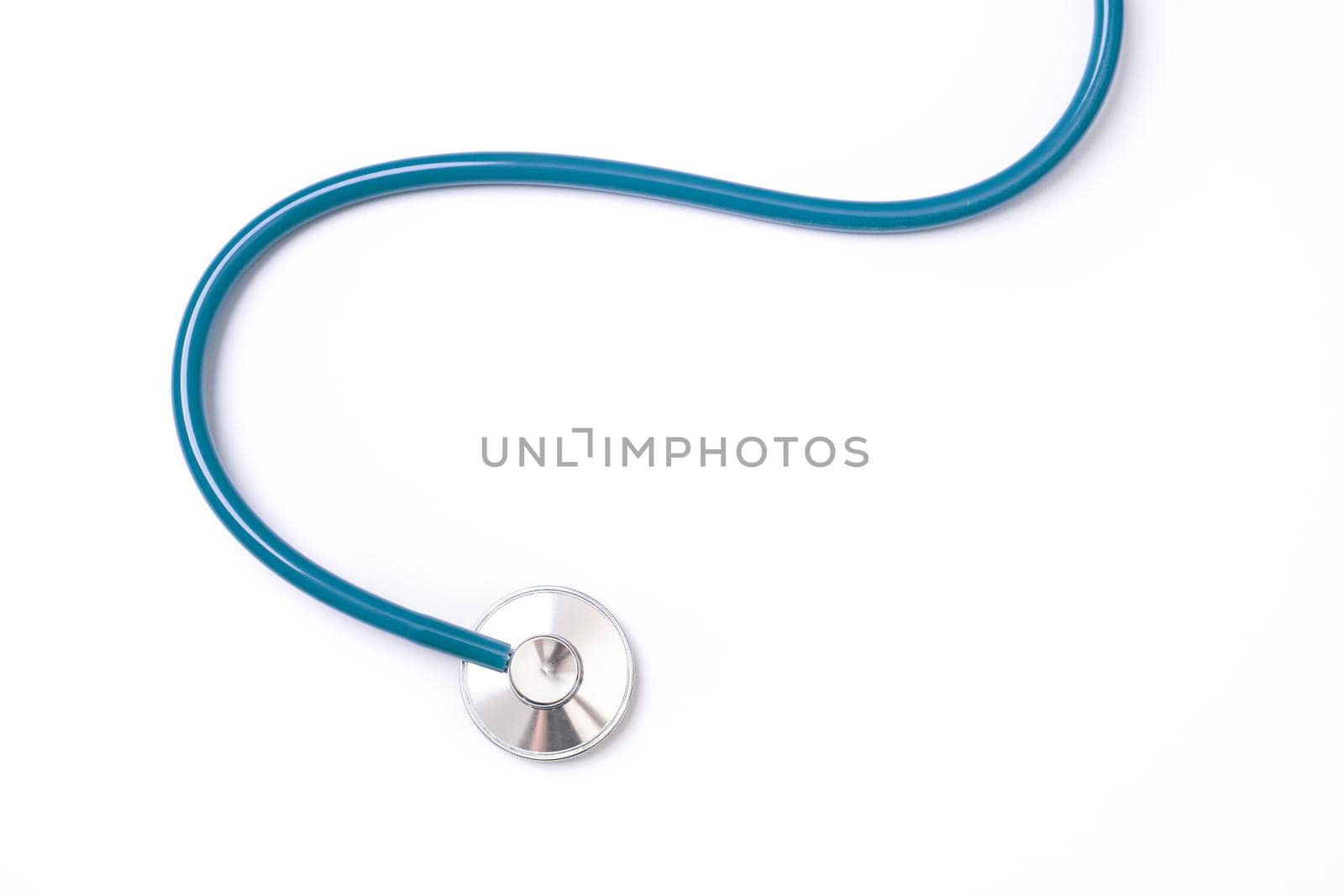 Green stethoscope, object of doctor equipment, isolated on white background. Medical design concept, cut out, clipping path, top view, studio shot.