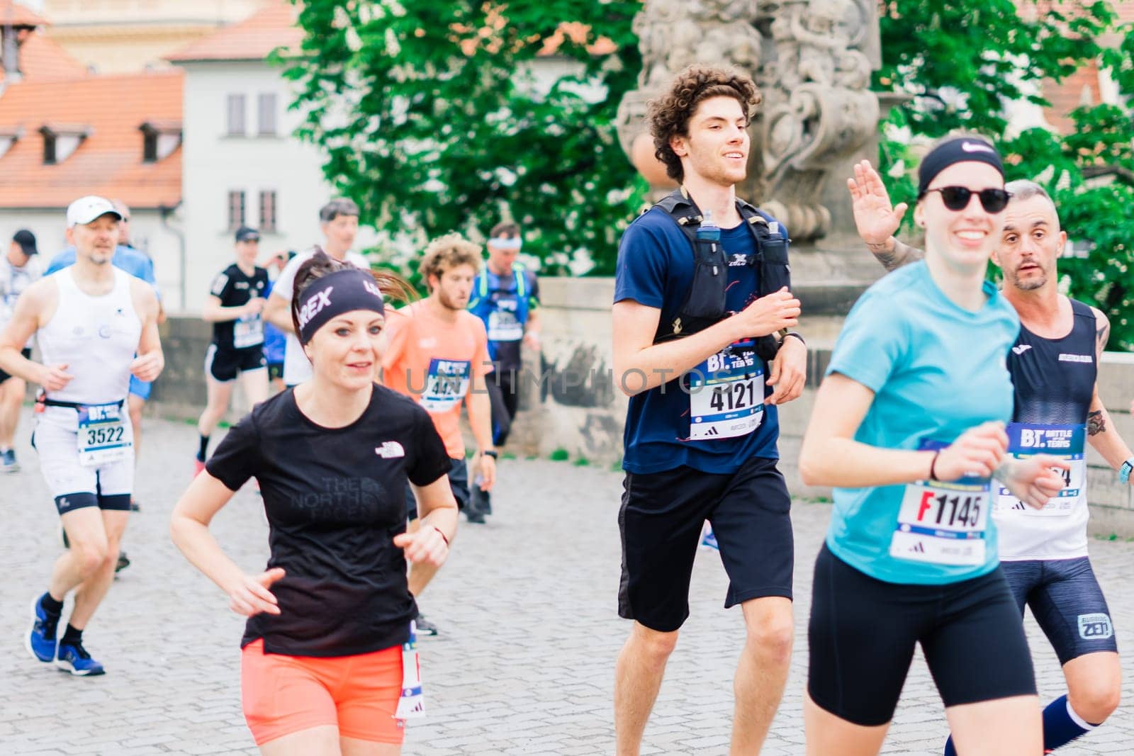 Prague, Czechia - 7th May 2023 - Runners of Prague Half marathon in the city streets.