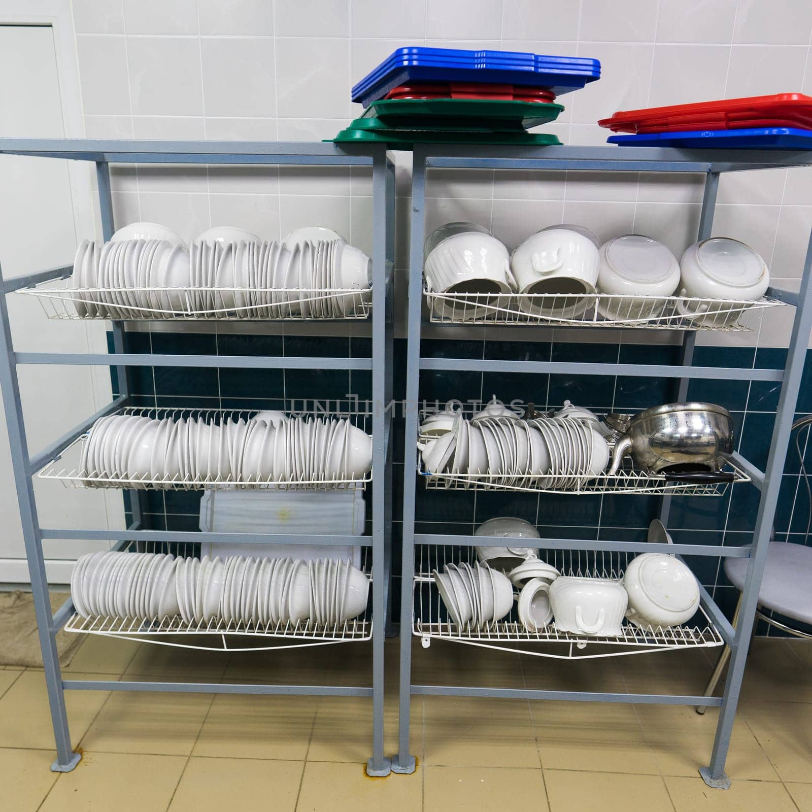 Restaurant kitchen equipment for preparing food, meal, plates, detail. by Zelenin