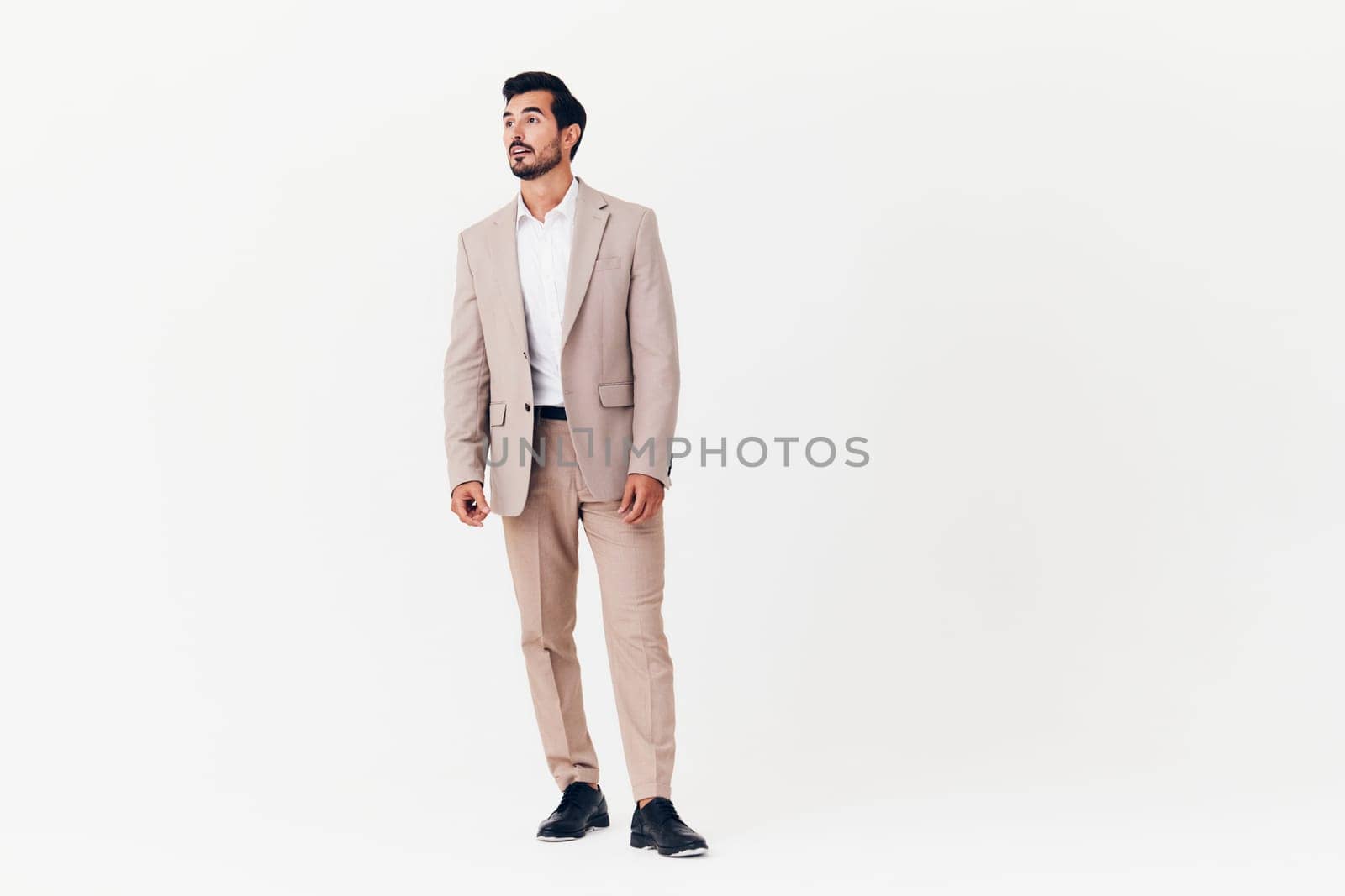 happy man running businessman suit smiling jumping winner business victory beige by SHOTPRIME