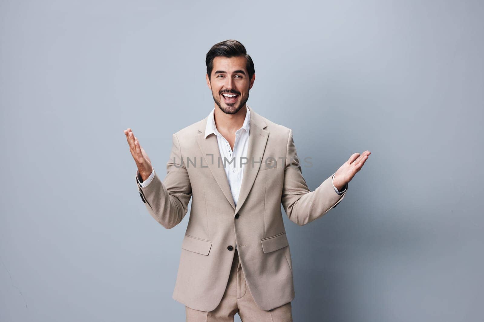 man arm winner business white hand attractive confident happy posing young isolated celebrate sexy beige businessman person job suit victory copyspace