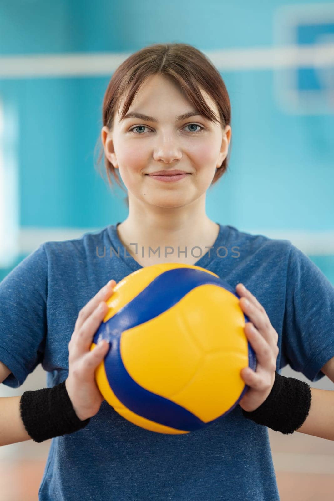 Portrait of a young girl with volleyball by VitaliiPetrushenko