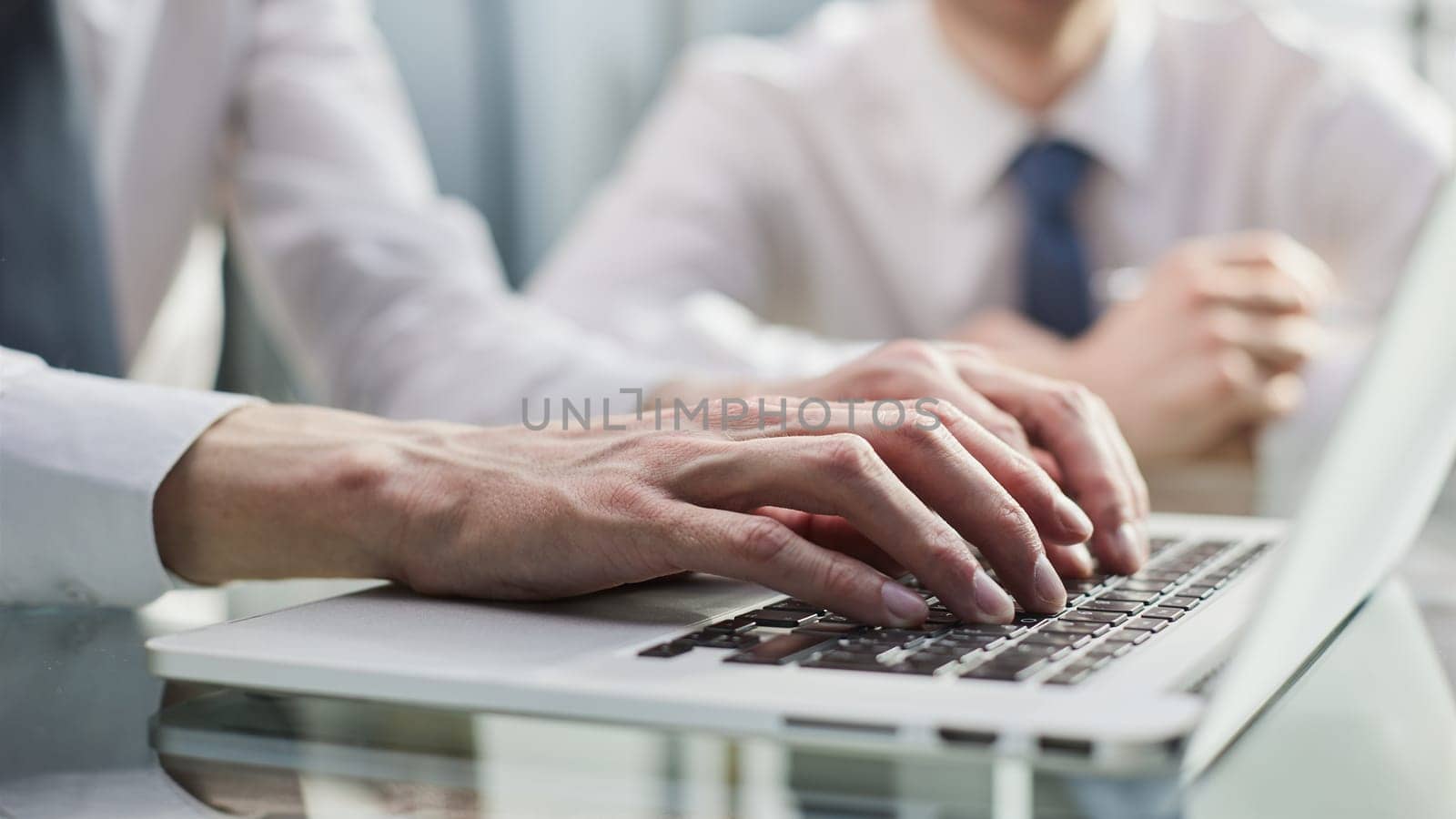 close up. two business men sitting at an office Desk