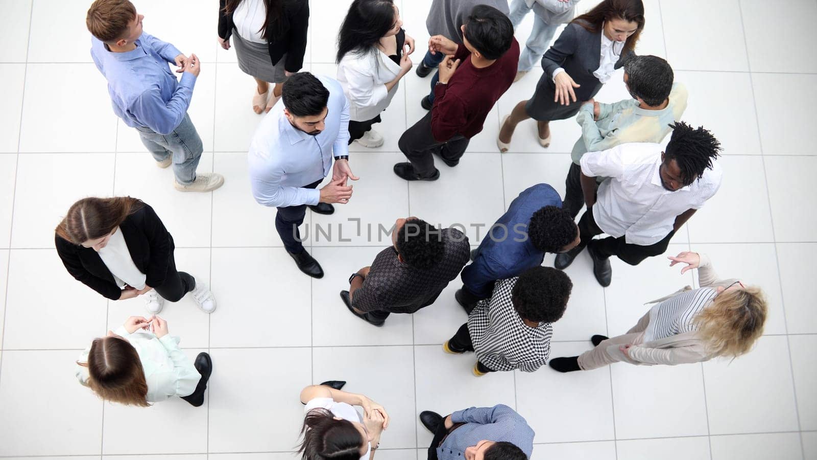 young multi ethnic business people group walking standing and top view by Prosto