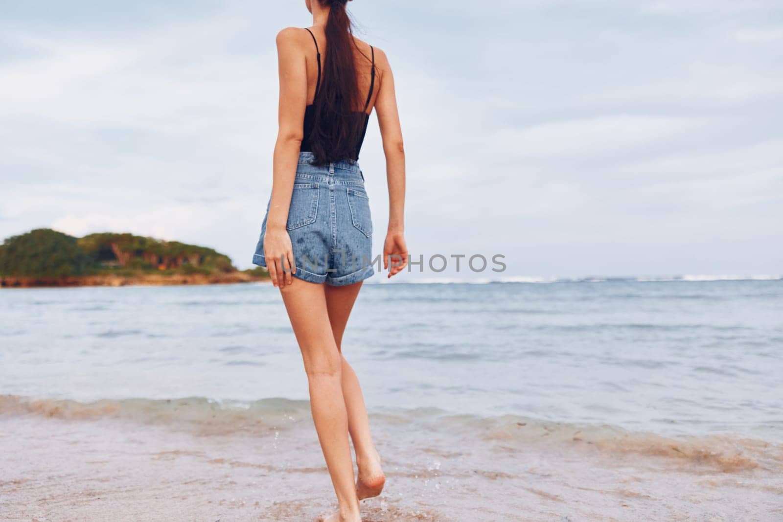 woman running sexy carefree beach sunset sea copy smile hair walking happiness young happy beauty space ocean lifestyle travel flight tan summer