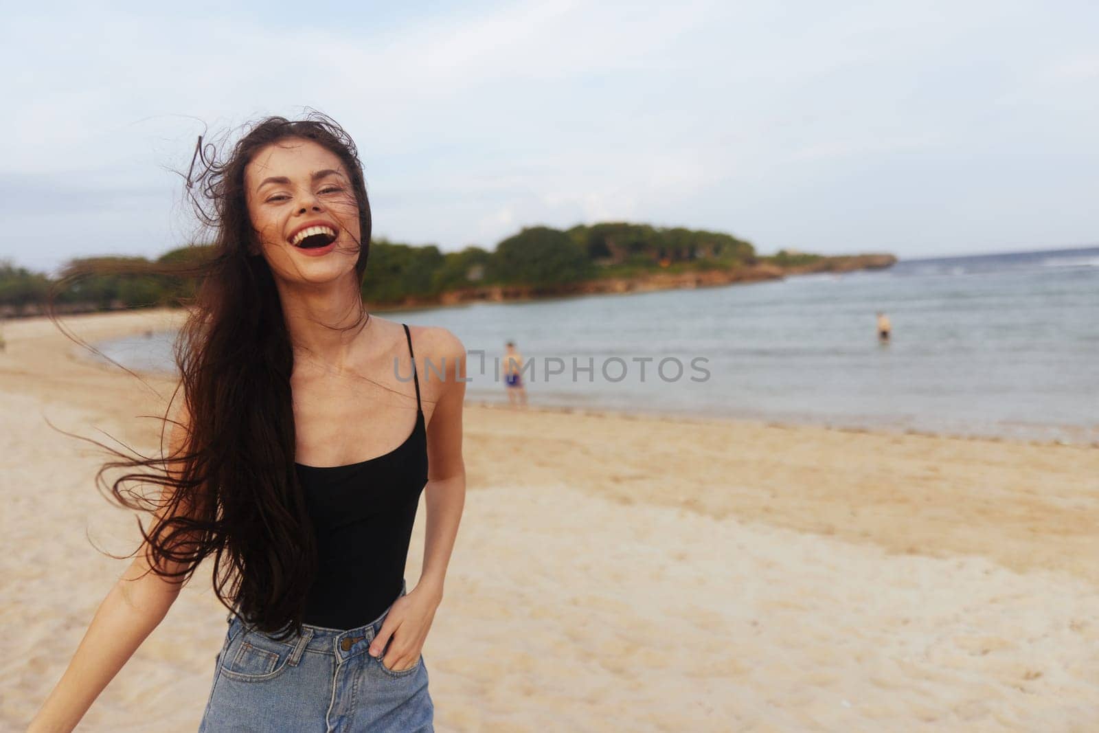 happiness woman ocean smile dress sunset lifestyle tropical beach caucasian sand summer girl vacation beauty female sea sky copy-space leisure coast