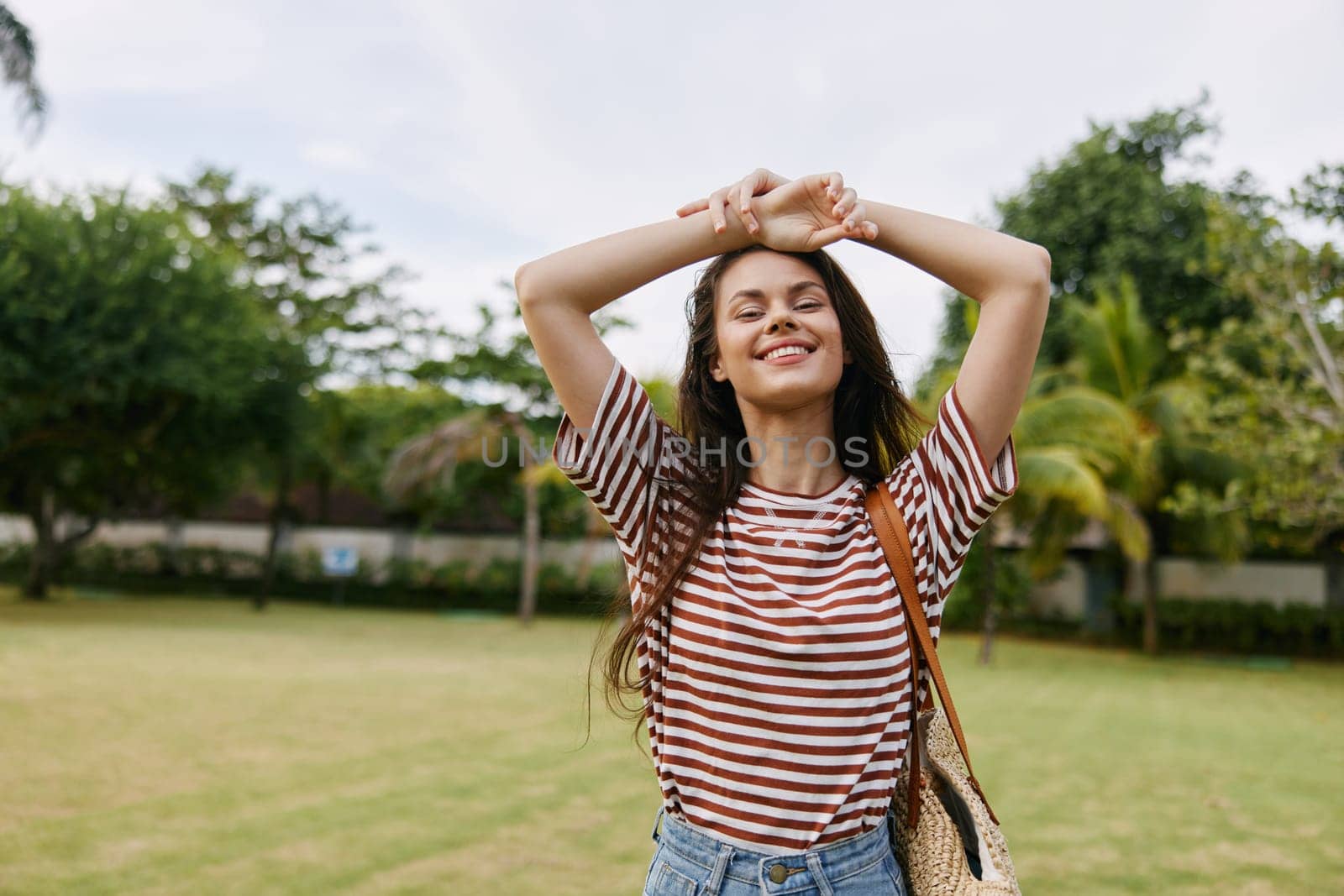 woman smile active summer walk smiling park bali natural t-shirt exercise day fun hipster lifestyle grass beautiful girl nature happiness freedom