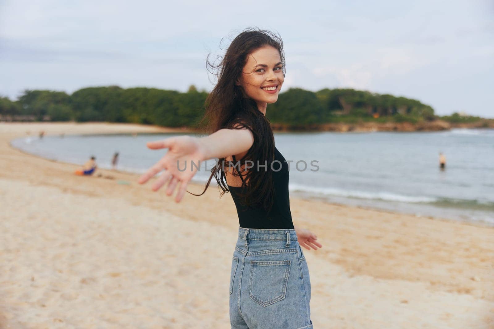 beach woman person young running sea adult lifestyle happiness caucasian tropical vacation free leisure water nature summer ocean sunset smile sand