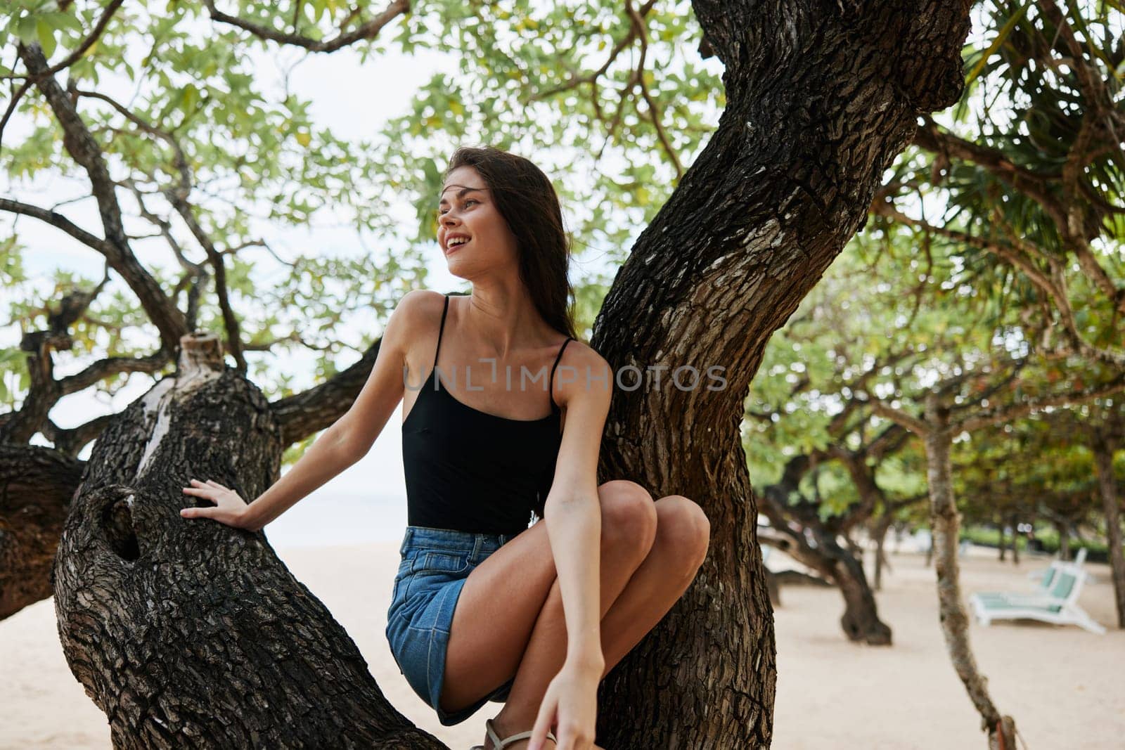 relax woman nature hill sky lifestyle smiling tree sea vacation sitting by SHOTPRIME
