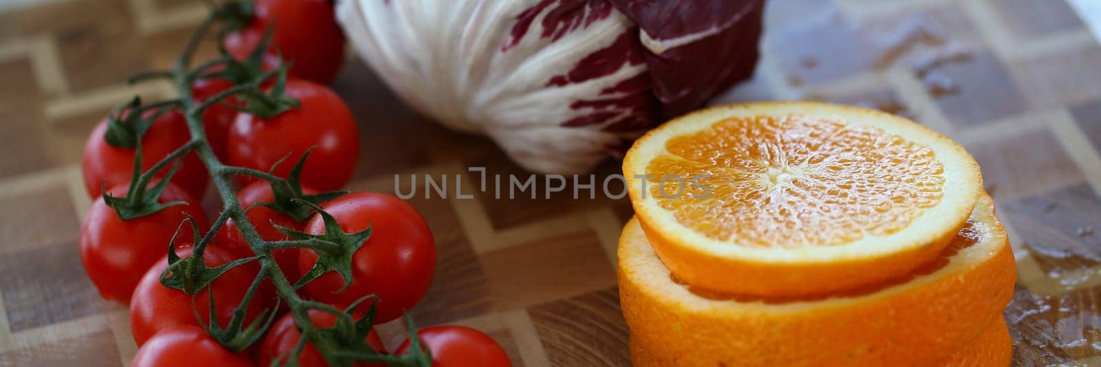 Set of vegetables and fruits on cutting board by kuprevich