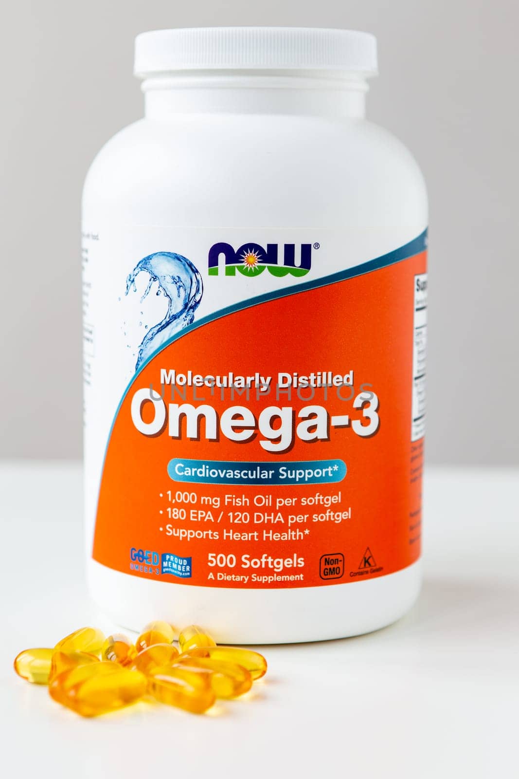 Kyiv, Ukraine - 27 January 2022: Now Foods Omega-3 natural fish oil concentrate - purified at the molecular level. Jar with of omega capsules for cardiovascular support from Natural Organic Wholesome. by sfinks