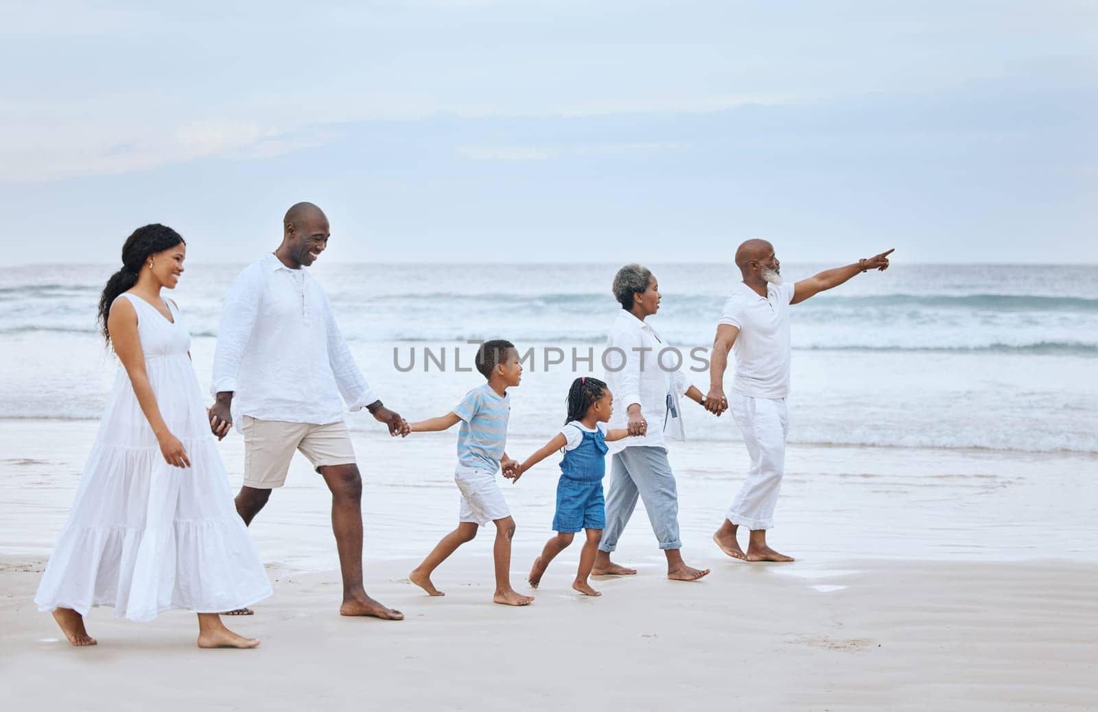 Family walk on beach sand, holding hands and generations, tropical vacation in Mexico, travel and trust outdoor. Grandparents, parents and kids, happy people with adventure and tourism with sea view.