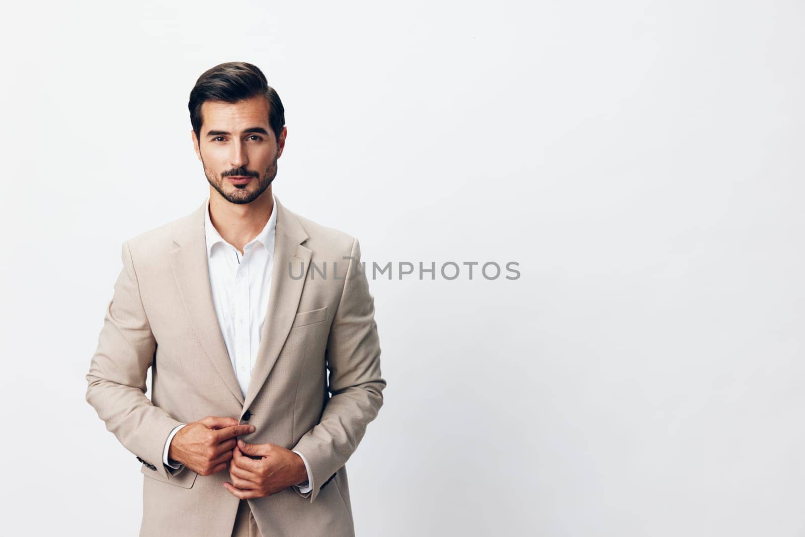 man beige copyspace happy attractive tie portrait smiling background arm success beard grey office folded fashion businessman confident handsome suit business