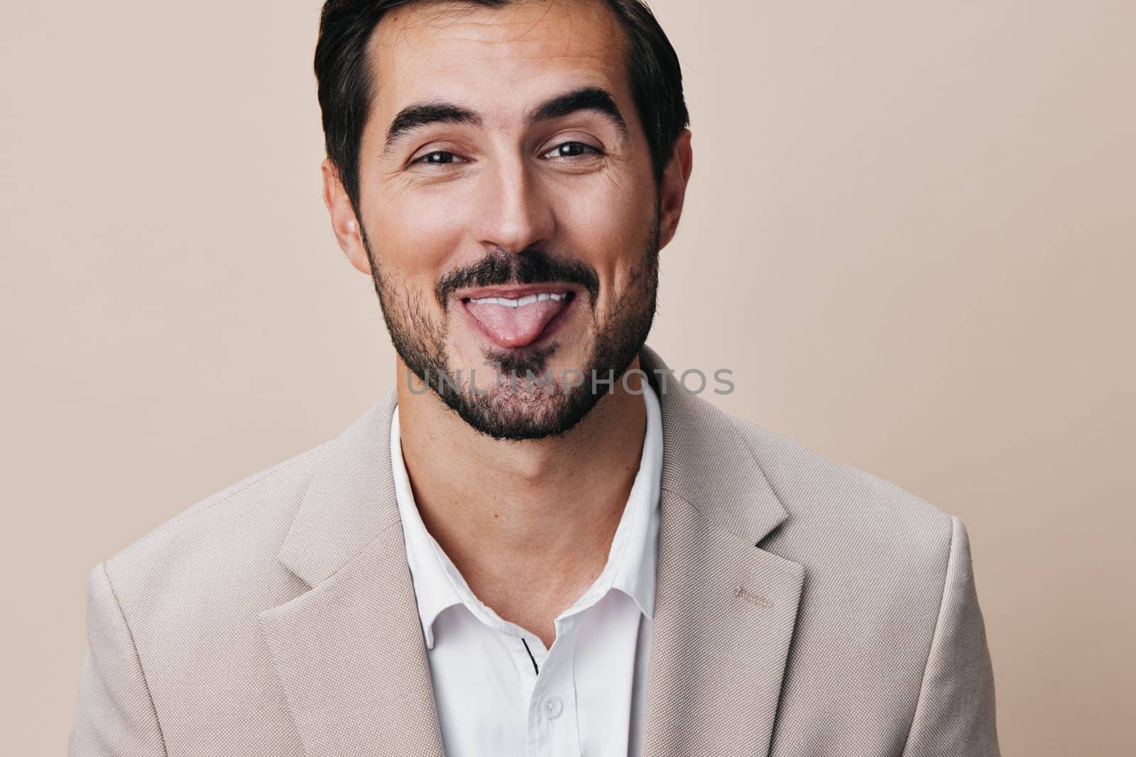 copyspace man arm stylish office business beige happy smiling crossed portrait smile suit confident handsome posing formal eyeglass guy occupation businessman