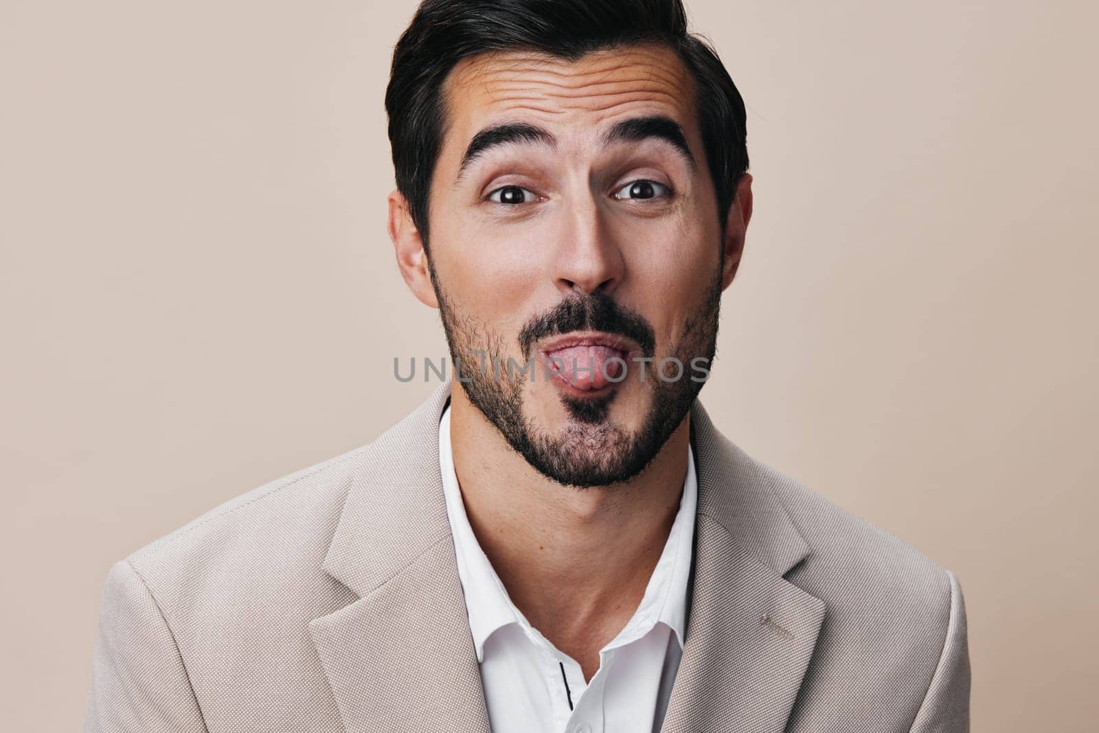 smiling man businessman copyspace handsome happy suit guy business beige portrait by SHOTPRIME