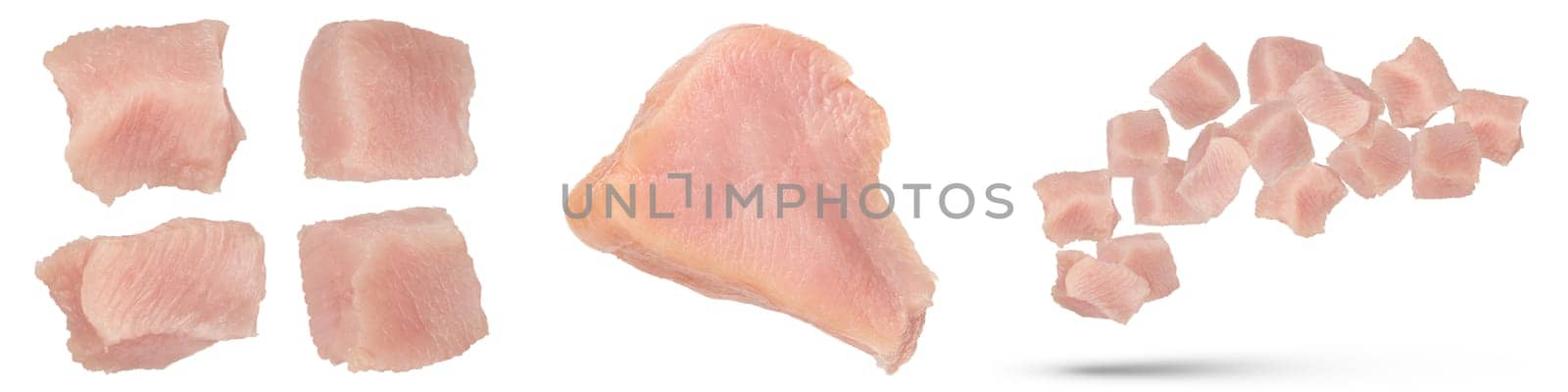 Turkish meat. Fresh set of fillet pieces and pieces of turkey isolated on white background. Isolate cubes and pieces of juicy turkey meat for advertising banner or product label. by SERSOL