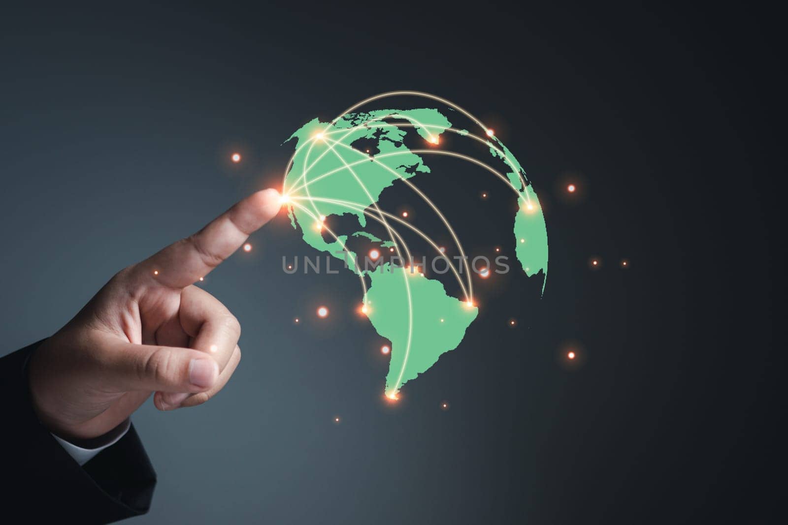 Businessman hand pointing at world map. concept of network communication by Unimages2527