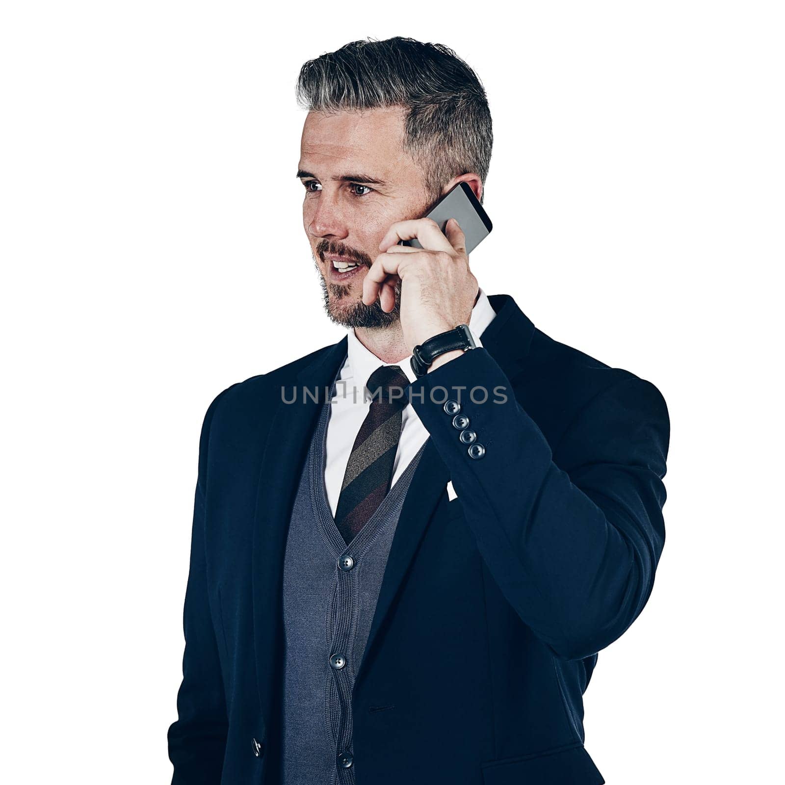 Everyones dialing his number. Studio shot of a businessman using a mobile phone against a white background. by YuriArcurs