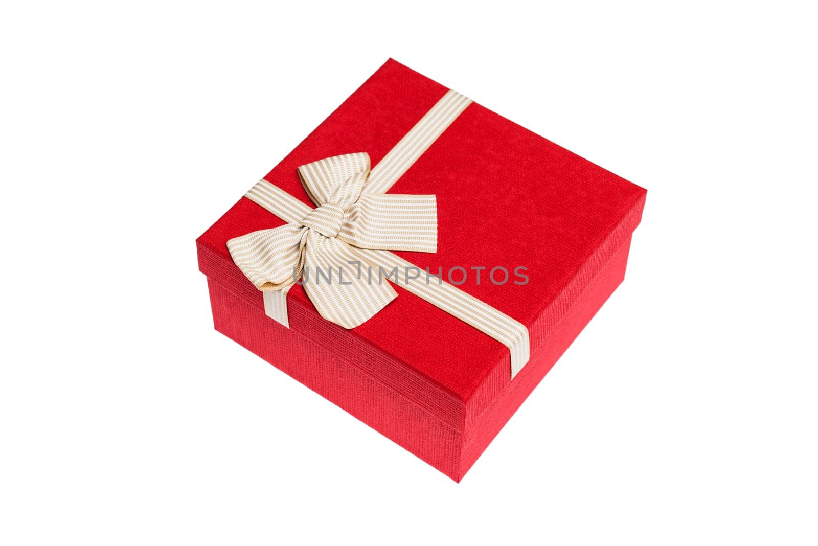 Red gift box with gold ribbon and bow isolated on white background.